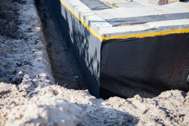 Professional Waterproofing technician working in Perry Hall, MD